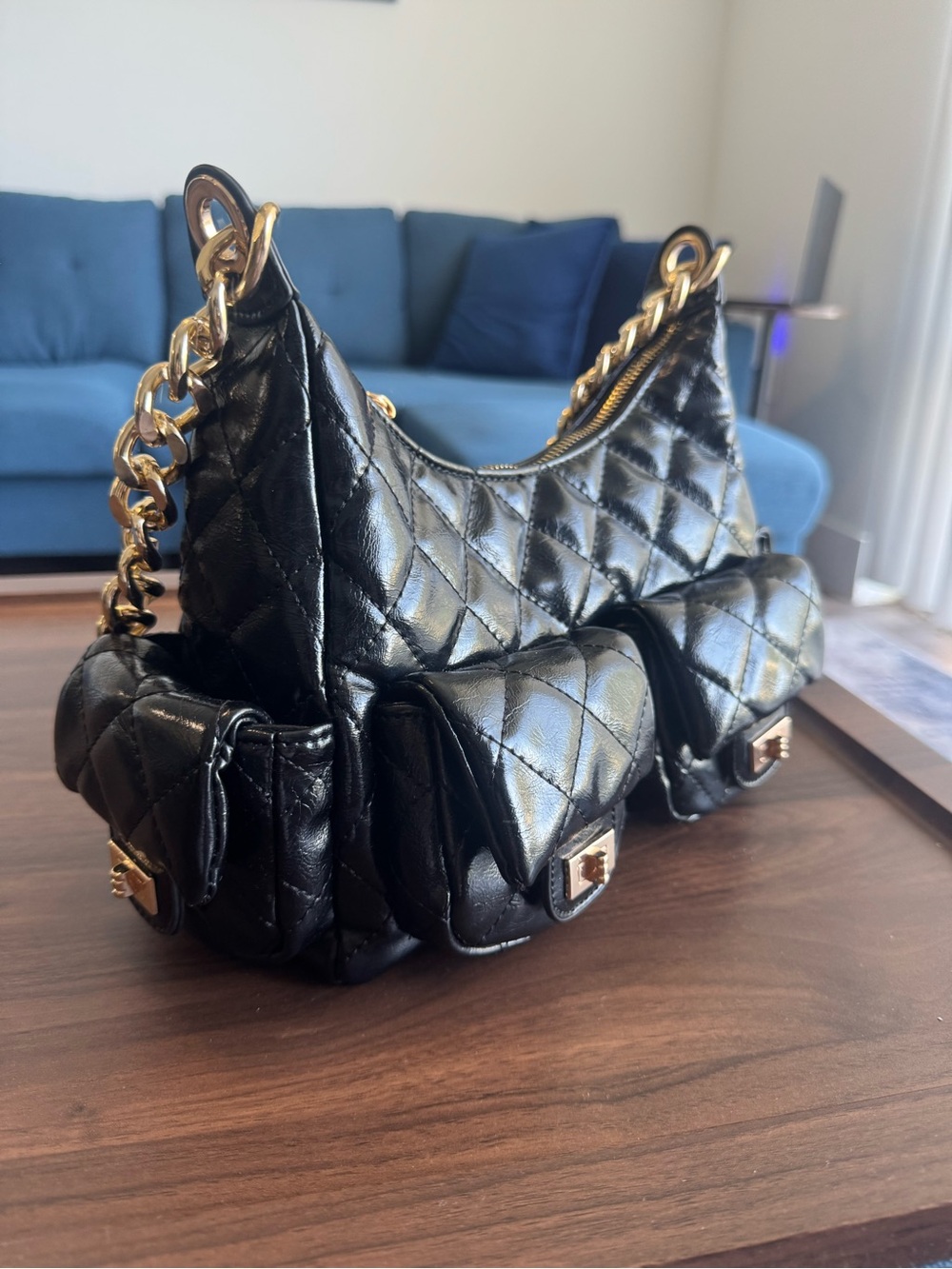 Black Quilted Leather Shoulder Bag with Gold Chain